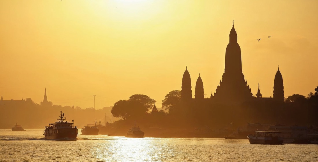 Wat Arun temple on the Chao Phraya River, Bangkok, Thailand